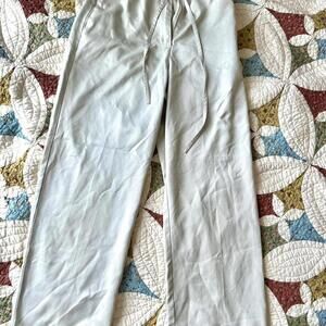 Light khaki Liz Claiborne dress trousers with drawstring waist. Size 6